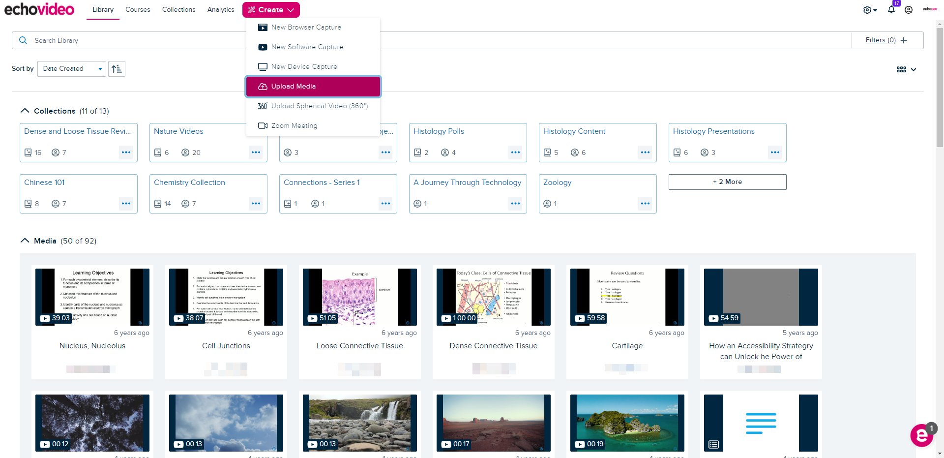 Library displayed with the Create button drop-down expanded and Upload Media highlighted in pink
