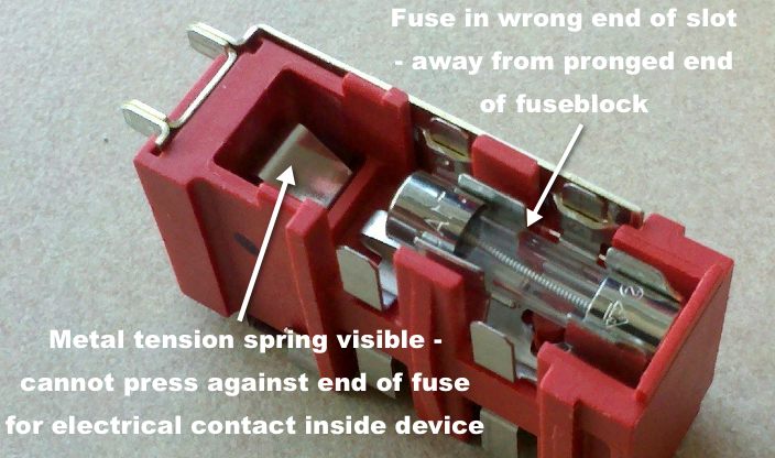 fuse block with fuse installed at wrong end of fuse slot